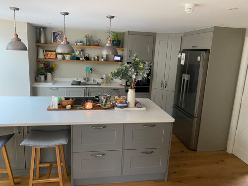 Open-plan view of living area and kitchen fitted in Magham Down by installers and builders from River.ODP building company.
