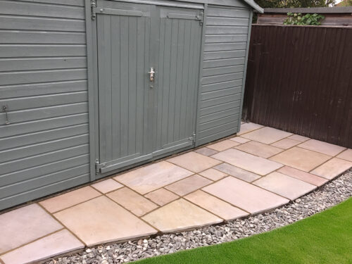 Small Indian Stone patio area built by River ODP in East Sussex