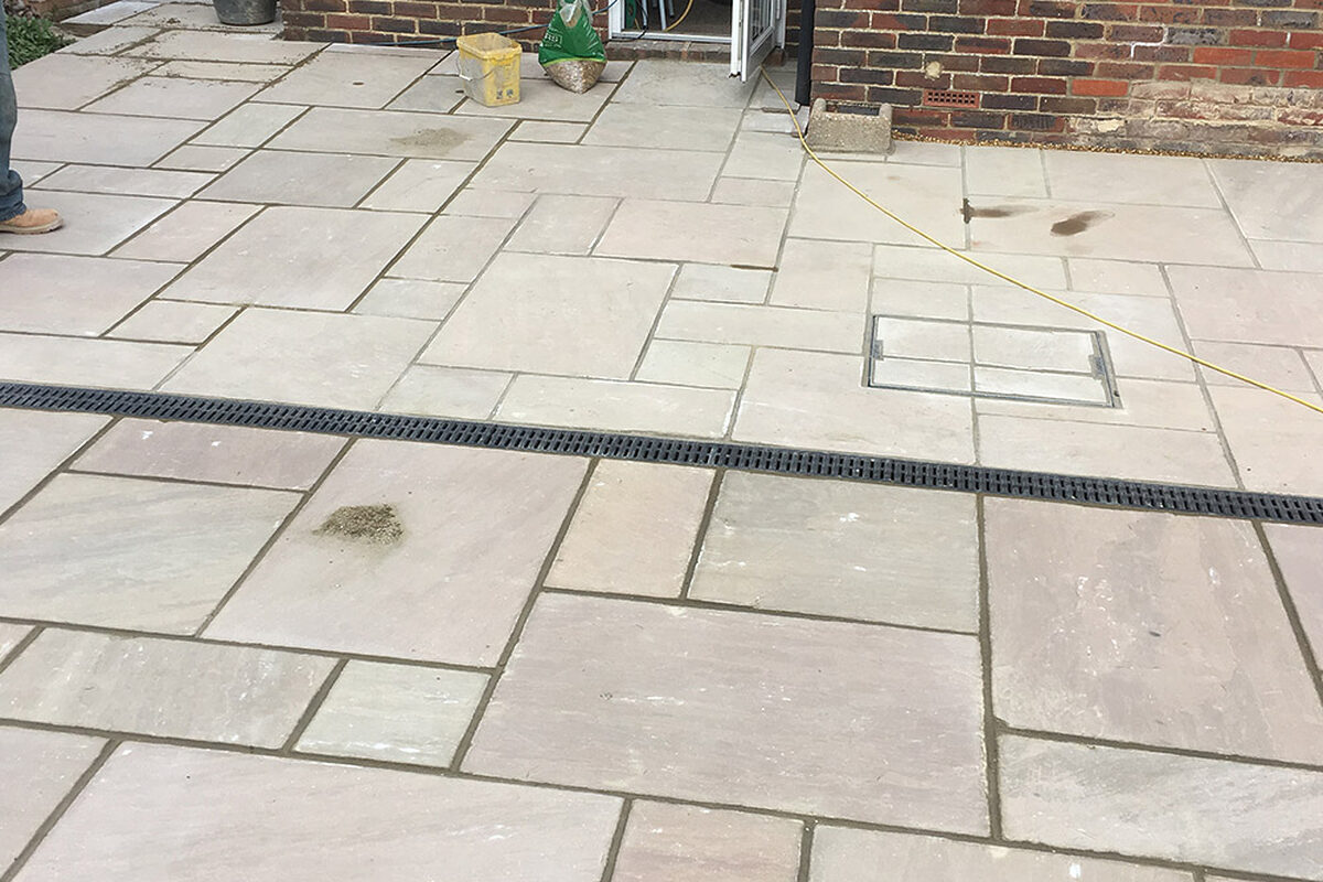 New patio on the back from indian stone slabs.