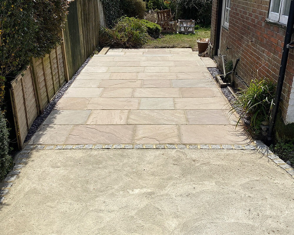 New Driveway by side a house installed from stone slabs by River ODP in Ticehurst