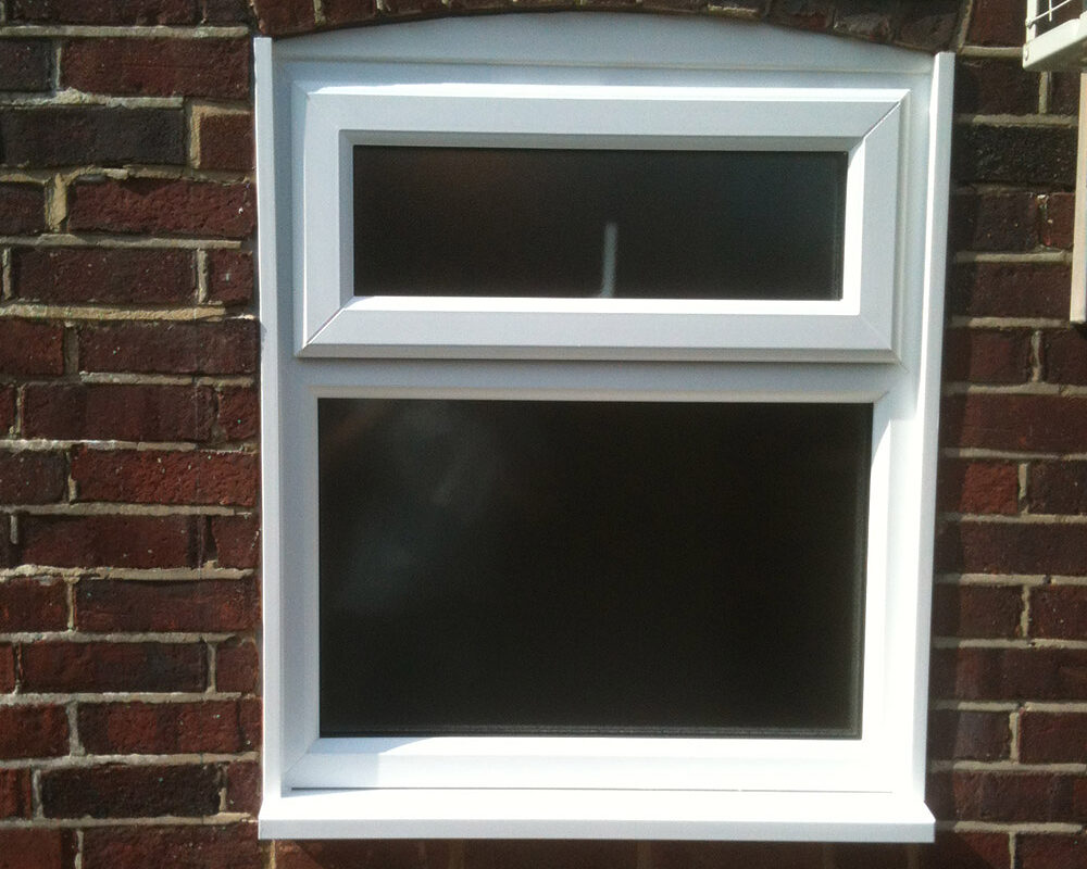 New white PVC window with upper leaf
