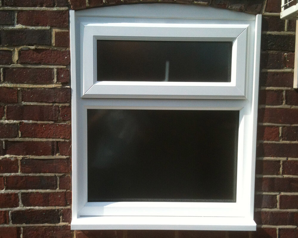 White UPVC Casement window with top leaf installed by River.ODP builders in Walton on Thames in Surrey