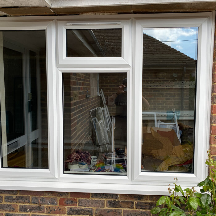 White UPVC triple Casement window with top leaf at the middle installed by River.ODP in Godalming in Surrey
