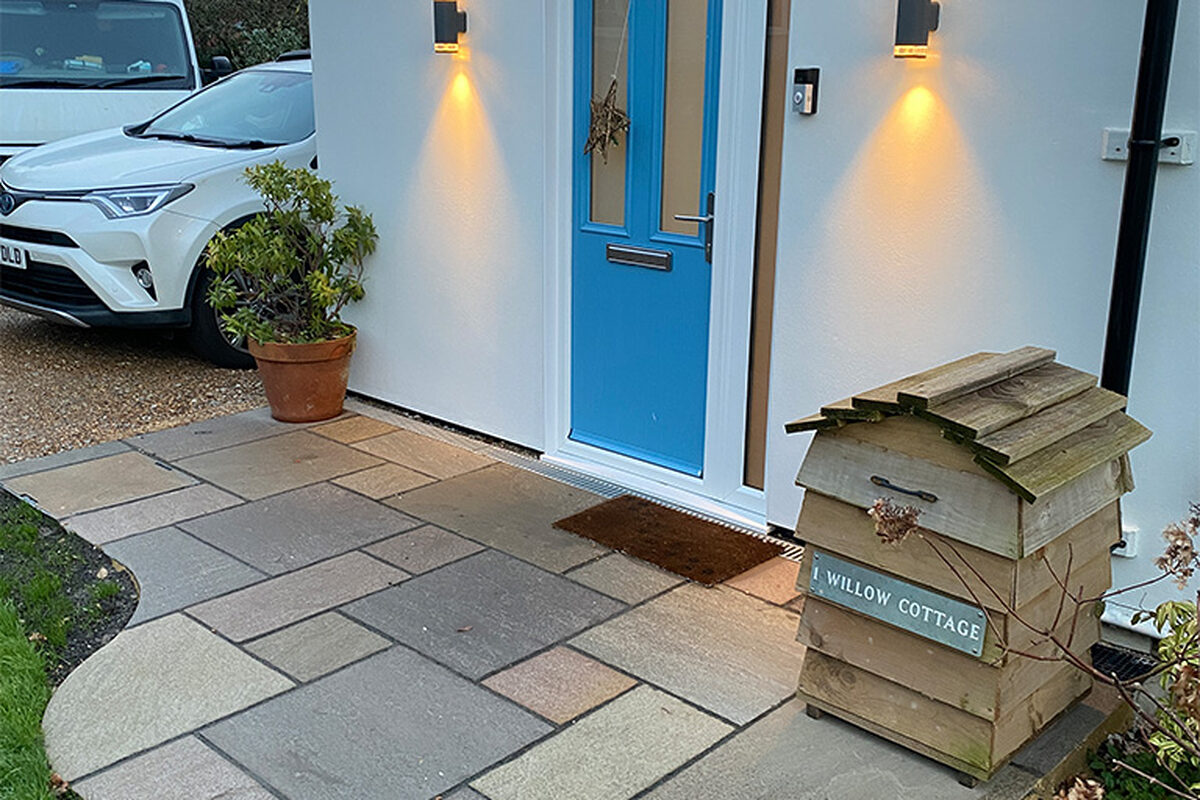 Indian Stone patio installed in front of a house in Magham Down by River ODP – a construction company.
