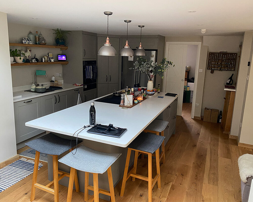 Open-plan view of living area and kitchen fitted in Henfield by installers and builders from River.ODP building company.