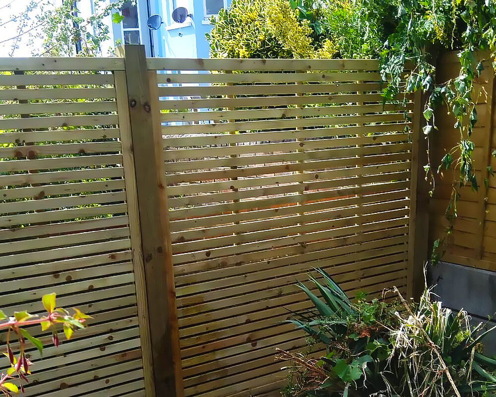 Timber slats panels installed by construction company River ODP in Bexhill