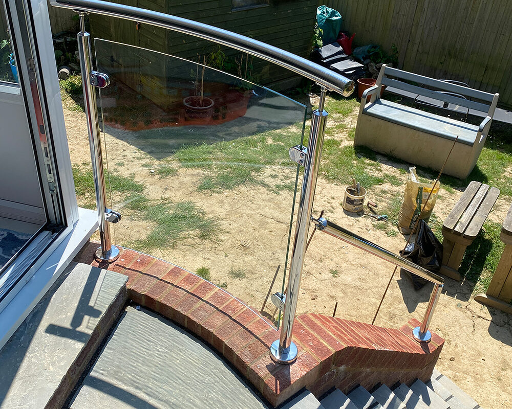 View on one part of stainless steel glass balustrade installed in Bexhill house by Contractor River.ODP