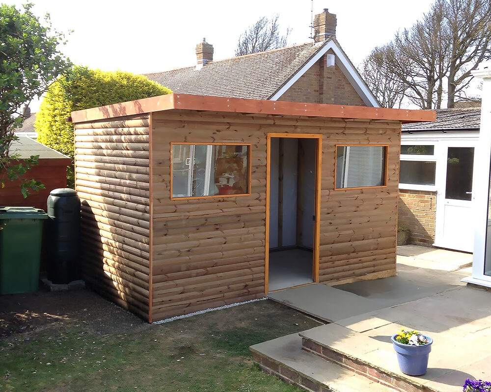 Insulated garden study room with wooden cladding built in Mayfield by River.ODP building company.