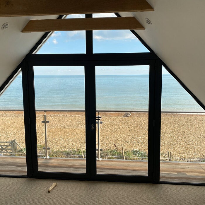 NormansBay Eastbourne windows fitting, roof windows, new build house, panoramic windows, floors.