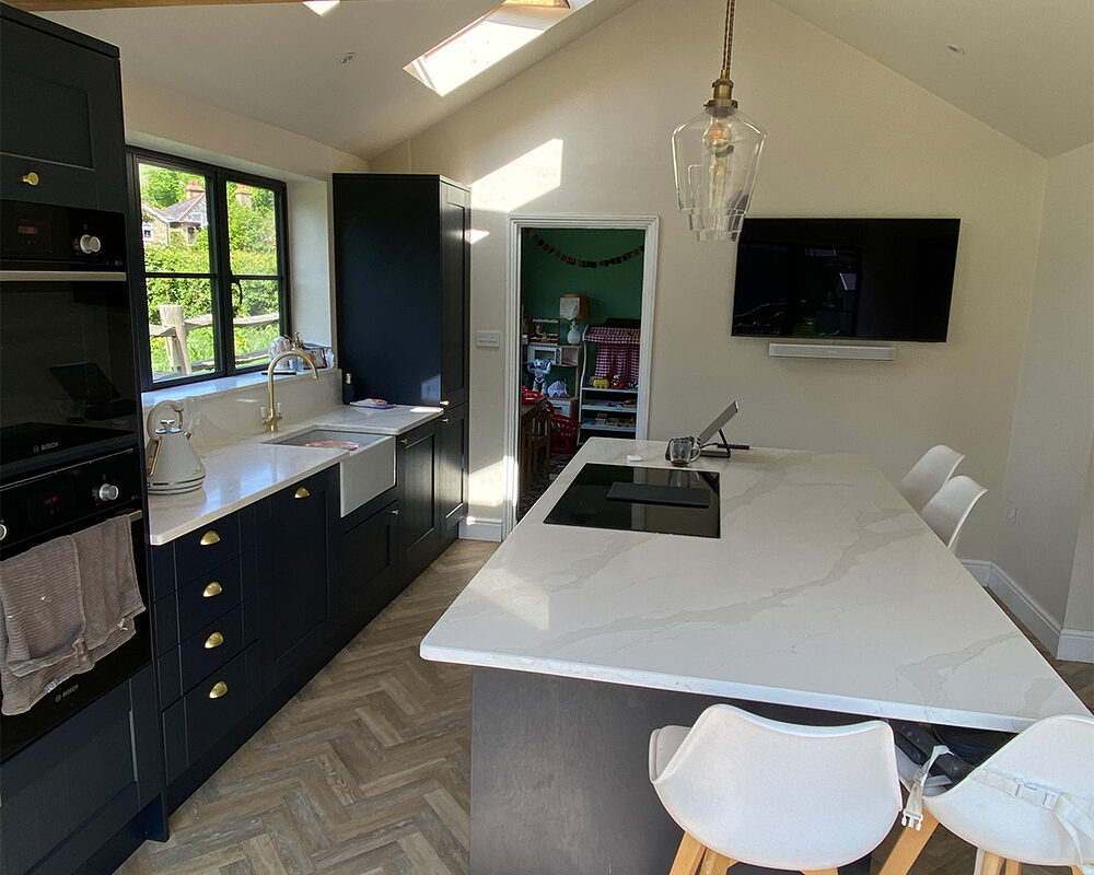 Marine blue kitchen installation with quartz worktop fitted by kitchen installers in Dover - River.ODP, building company.