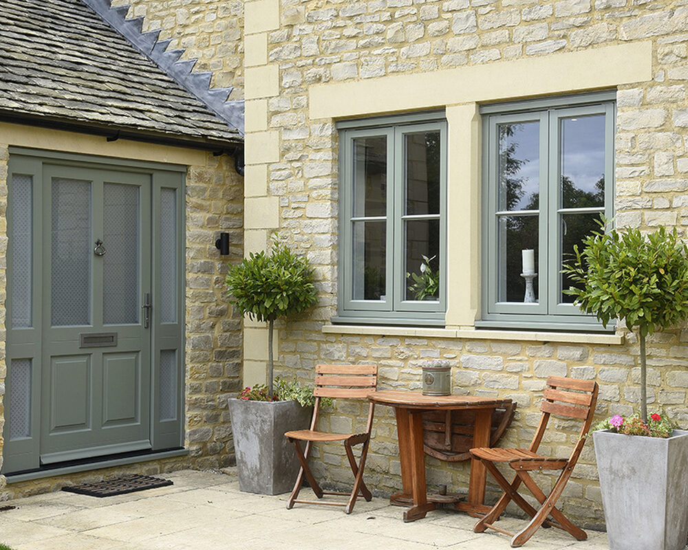 Timber cottage Flush casement windows and front door installed in mansion in Surrey.