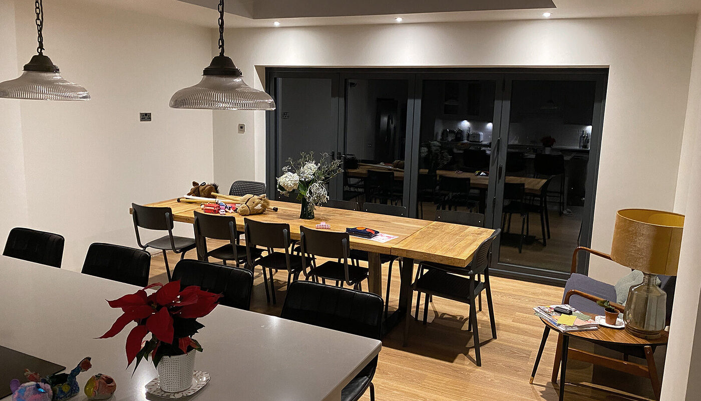View from kitchen to dining area extension in Wadhurst made by building company River.ODP, kitchen installers and designers.