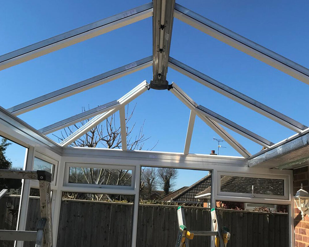 view from inside on clear glass roof of Edwardian conservatory installed by River.ODP in East Sussex.