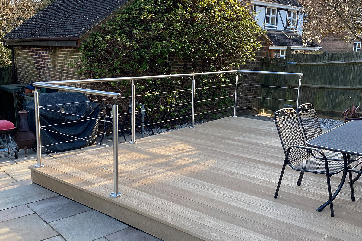 Indian stone patio and composite decking with steel balustrade