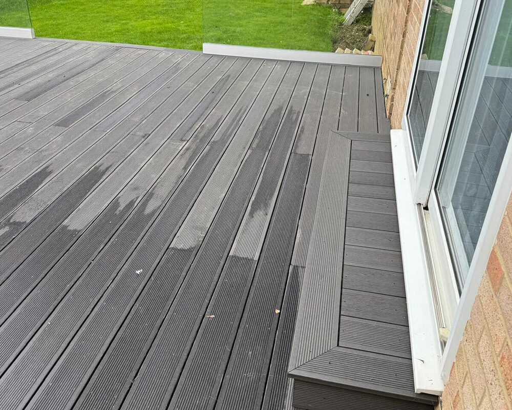 Composite decking and Frameless glass balustrade installation in Staines by building company River.ODP.