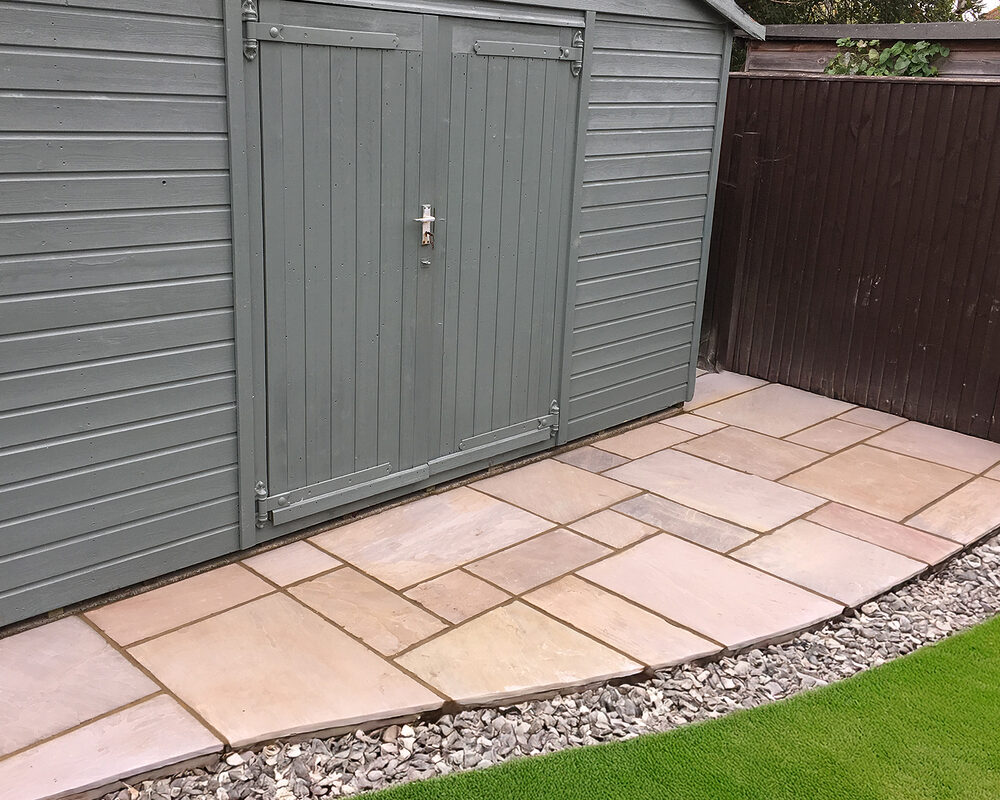 Small Indian Stone patio area built by River ODP in East Sussex