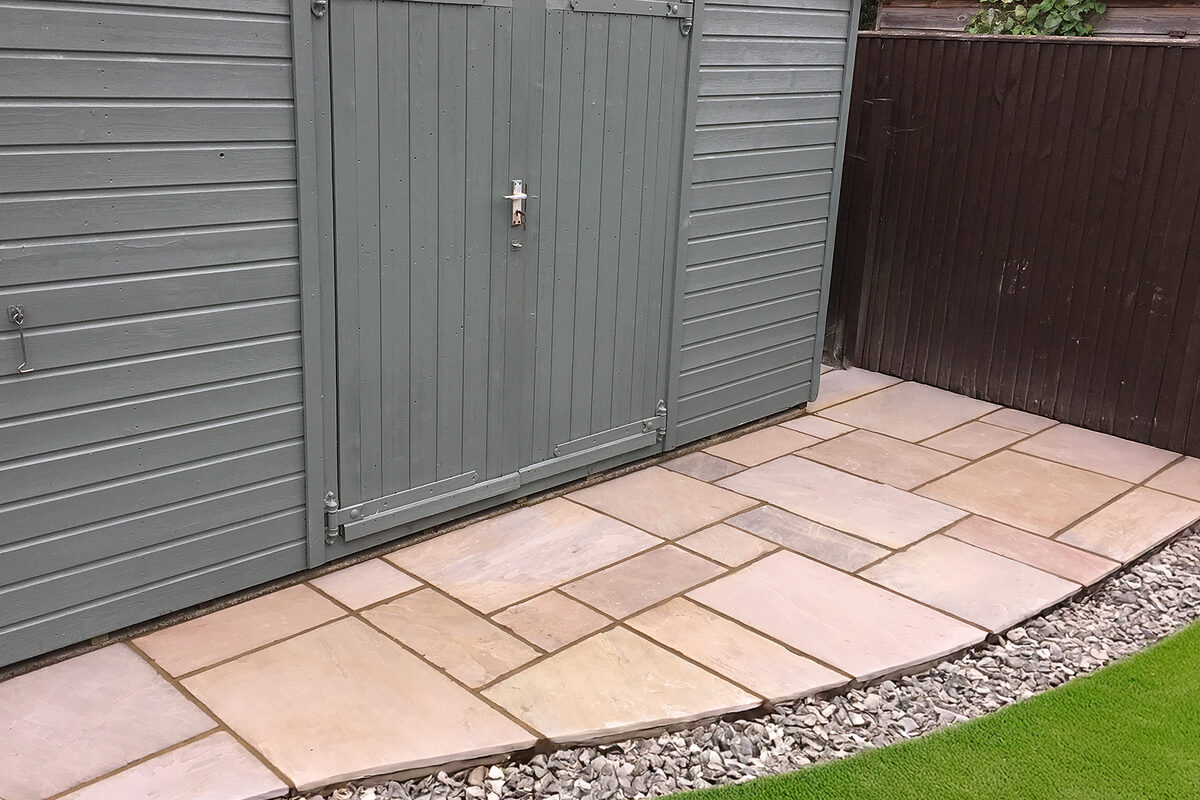 Small Indian Stone patio area built by River ODP in East Sussex