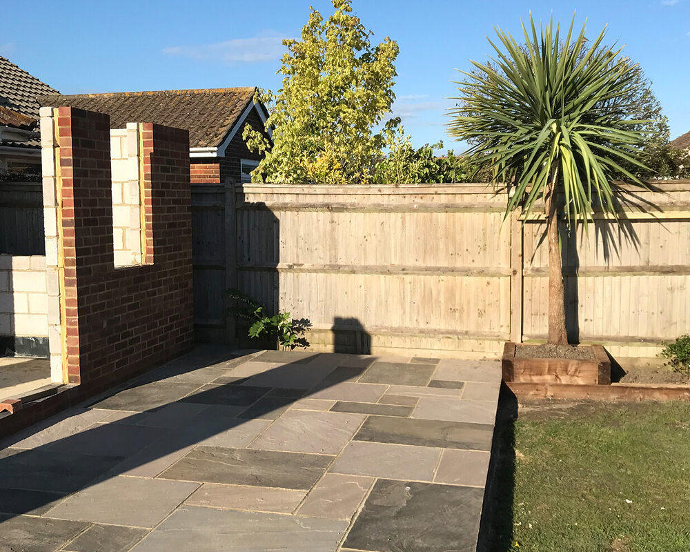 Large Indian Stone Patio and orangery in progress built by River ODP in Eastbourne