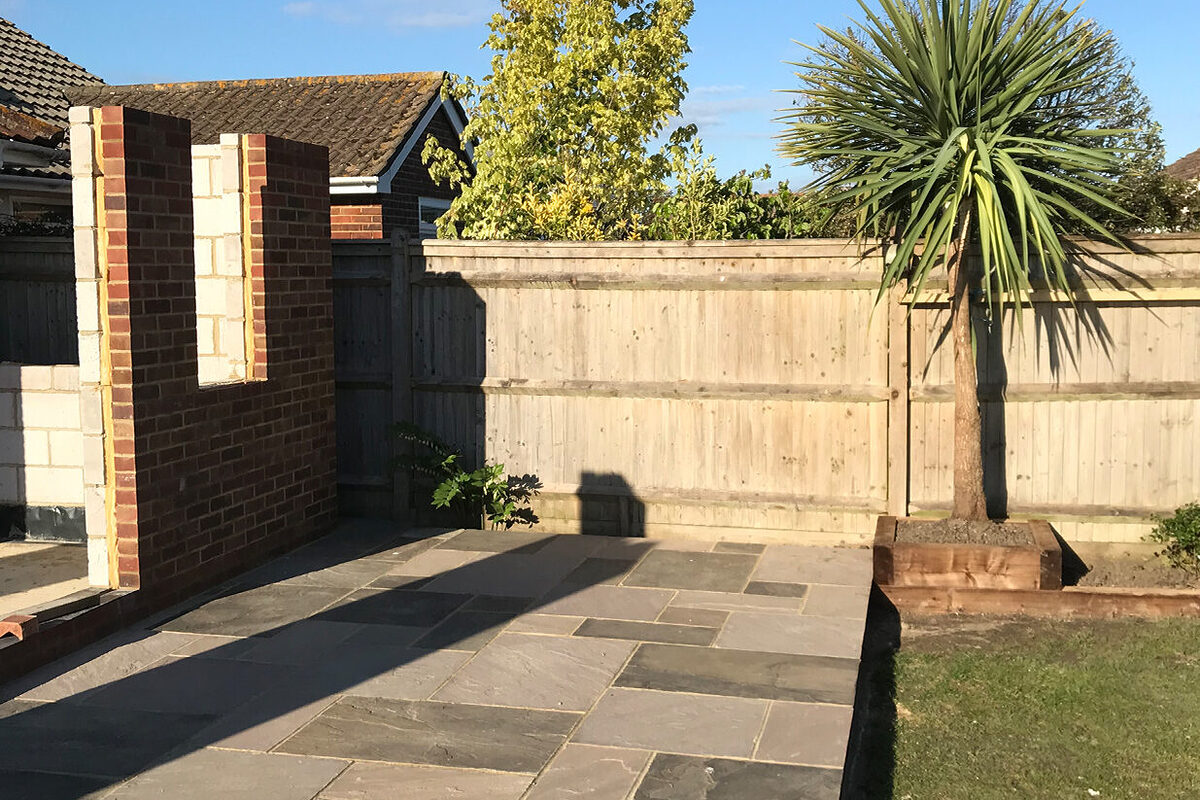 Large Indian Stone Patio and orangery in progress built by River ODP in Eastbourne