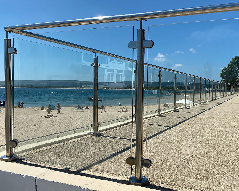 Glass and stainless-steel balustrade in property on the beach mounted by River.ODP in West Sussex