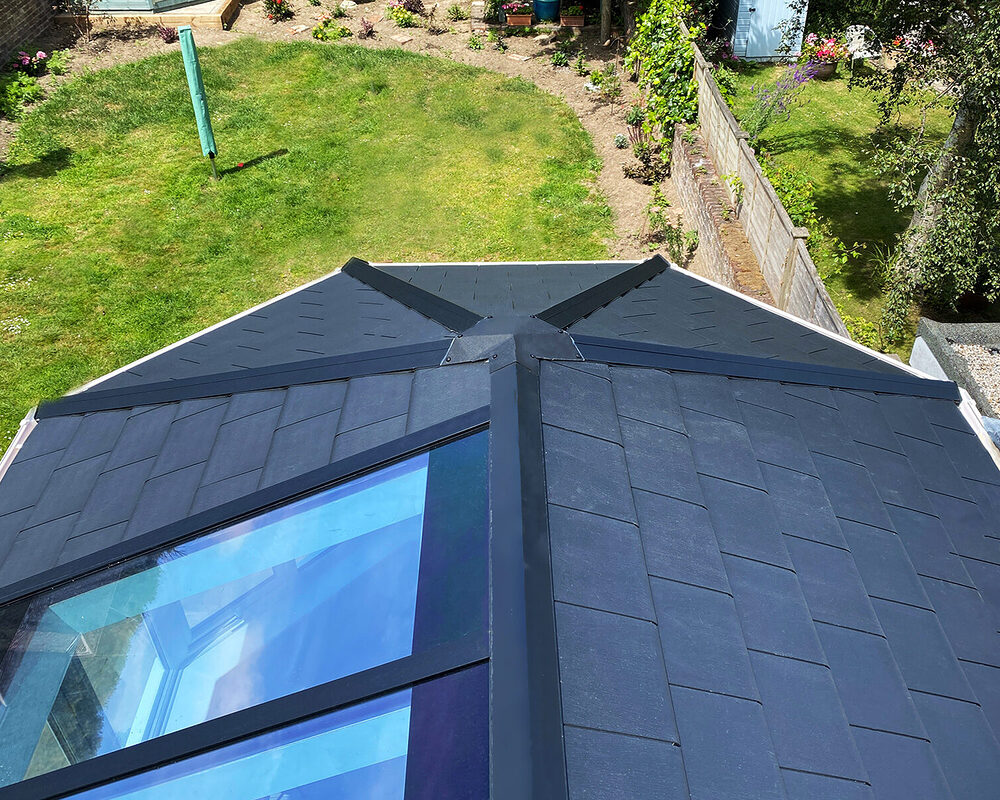 A view of the new tiled warm roof on a Victorian conservatory with double glazed skylight in Eastbourne, East Sussex.