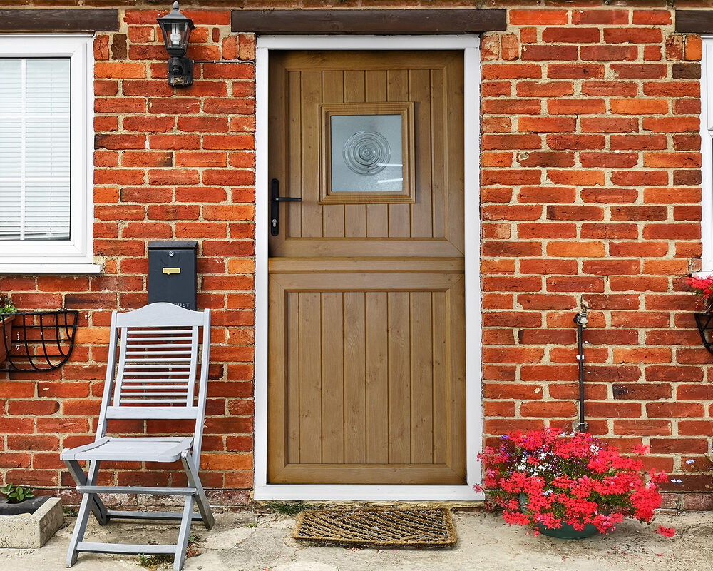 Stable composite door in wooden look like finish.