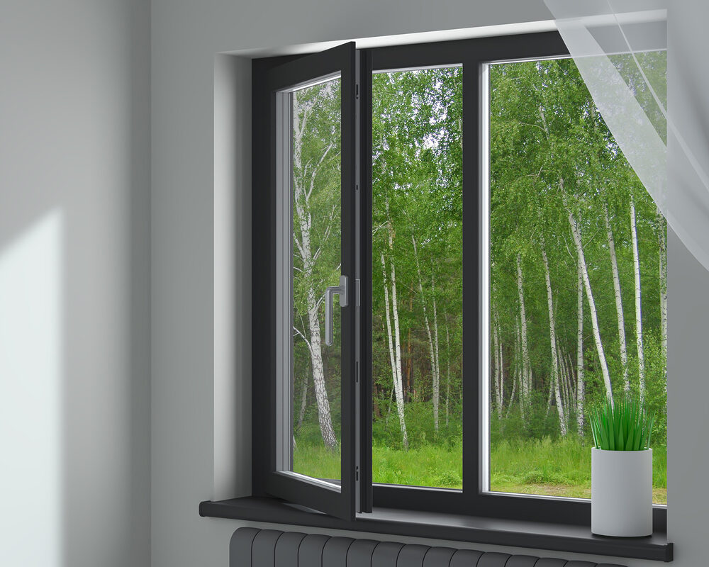 Inside house view on Aluminium Tilt and Turn window in grey installed in house in Tunbridge Wells by River ODP